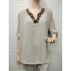 Blusa cuello pico detalle...