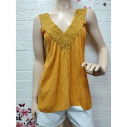 Top sin mangas cuello pico...