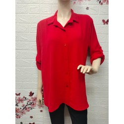 Camisa con botones detalle...