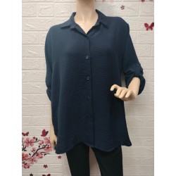Camisa con botones detalle...