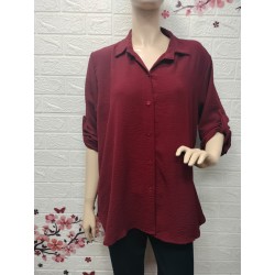 Camisa con botones detalle...