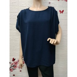 Blusa con detalle de...