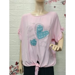Camiseta de color rosa...