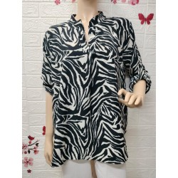 Blusa tipo túnica holgada...
