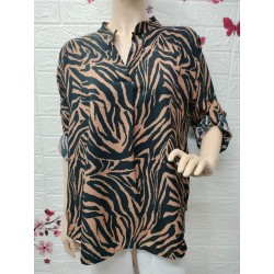 Blusa tipo túnica holgada...