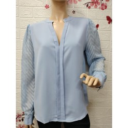 Blusa elegante con cuello...