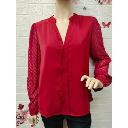 Blusa elegante con cuello...