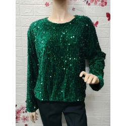 Blusa está confeccionada...