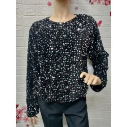 Blusa está confeccionada...