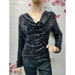 Blusa cubierta de...