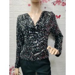 Blusa cubierta de...