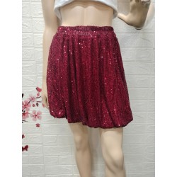 Mini falda cubierta de...