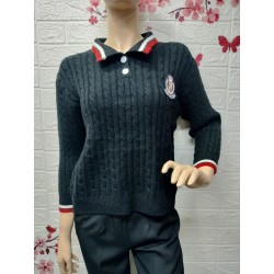 Suéter cuello tipo polo con...