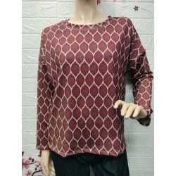 Blusa con rombos y brillos...